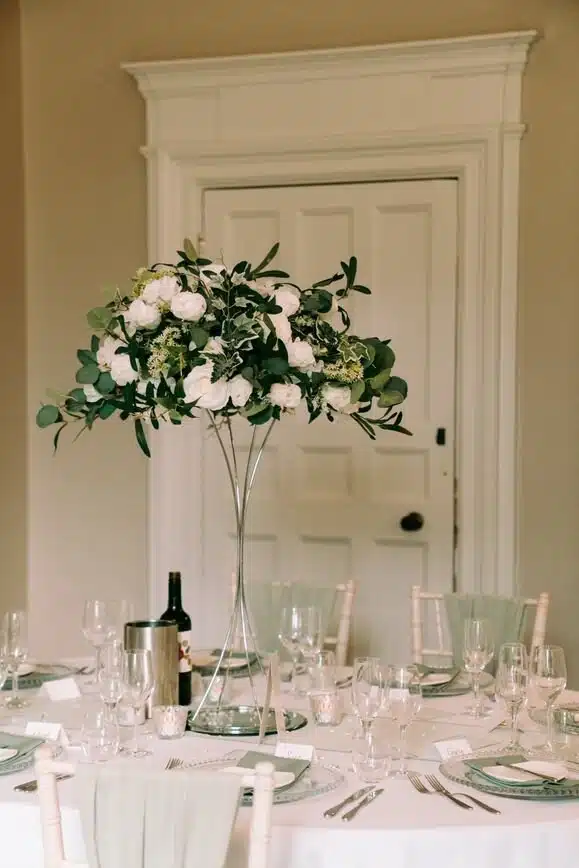 IVY CRUZ Flower Walls, Floral Arrangements | Commercial and Functions White Roses Green Foliage Wedding Table Centrepiece - Image 7