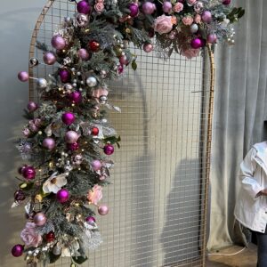 pink doorway christmas flower garland.