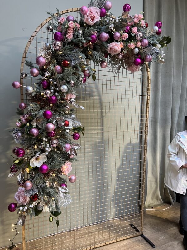 pink doorway christmas flower garland.